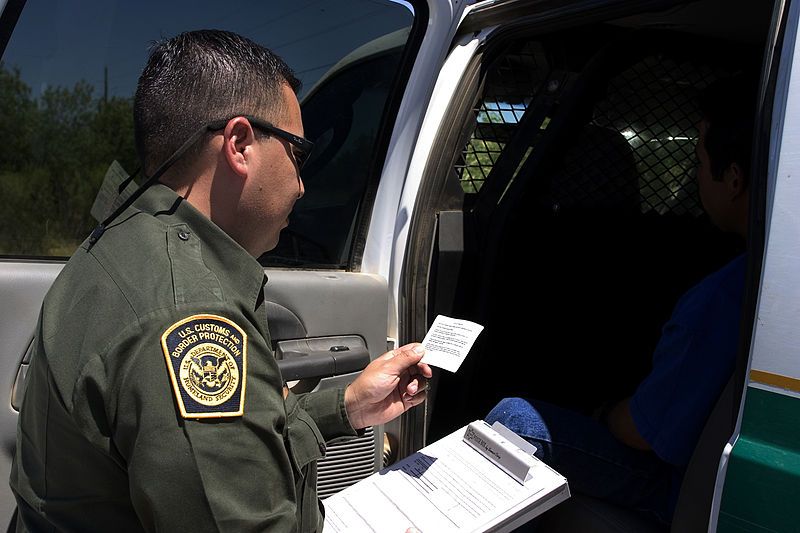CBP_Border_Patrol_agent_reads_the_Miranda_rights